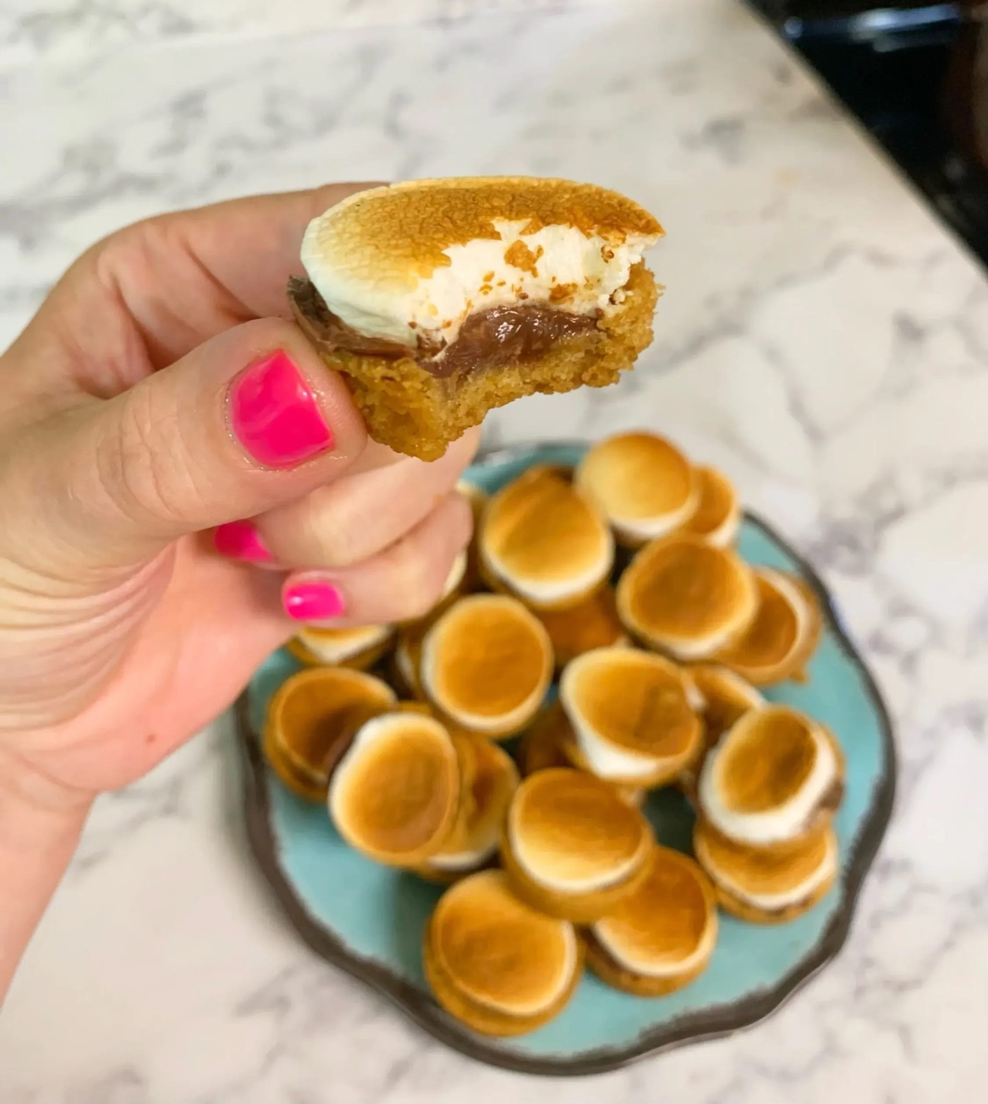 Ok so apparently we have an obsession with s'mores around here . . . I'm sure you've seen our popular S'mores Bars to feed a crowd (if you haven't, look at our IGTV videos for the recipe video).⁣
These are the cutest little 𝐌𝐢𝐧𝐢 𝐒'𝐦𝐨𝐫𝐞𝐬 𝐏𝐢𝐞𝐬 :-)⁣
A graham cracker crust filled with chocolate and marshmallow-y goodness. Plus, they stay together great when taken out of the muffin tin so they're easy to serve at a party as a finger food.⁣
FInd this delicious recipe at 𝗦𝗶𝘅𝗖𝗹𝗲𝘃𝗲𝗿𝗦𝗶𝘀𝘁𝗲𝗿𝘀.𝗰𝗼𝗺⁣
⁣
#sixcleversisters #smores #food #partyfood #easyrecipe #rotd #recipe #sweets #dessert #marshmallow #hersheys #recipes #nationalsmoresday #chocolate #baking #instabake #bake #homemade #homebaked #homebaking