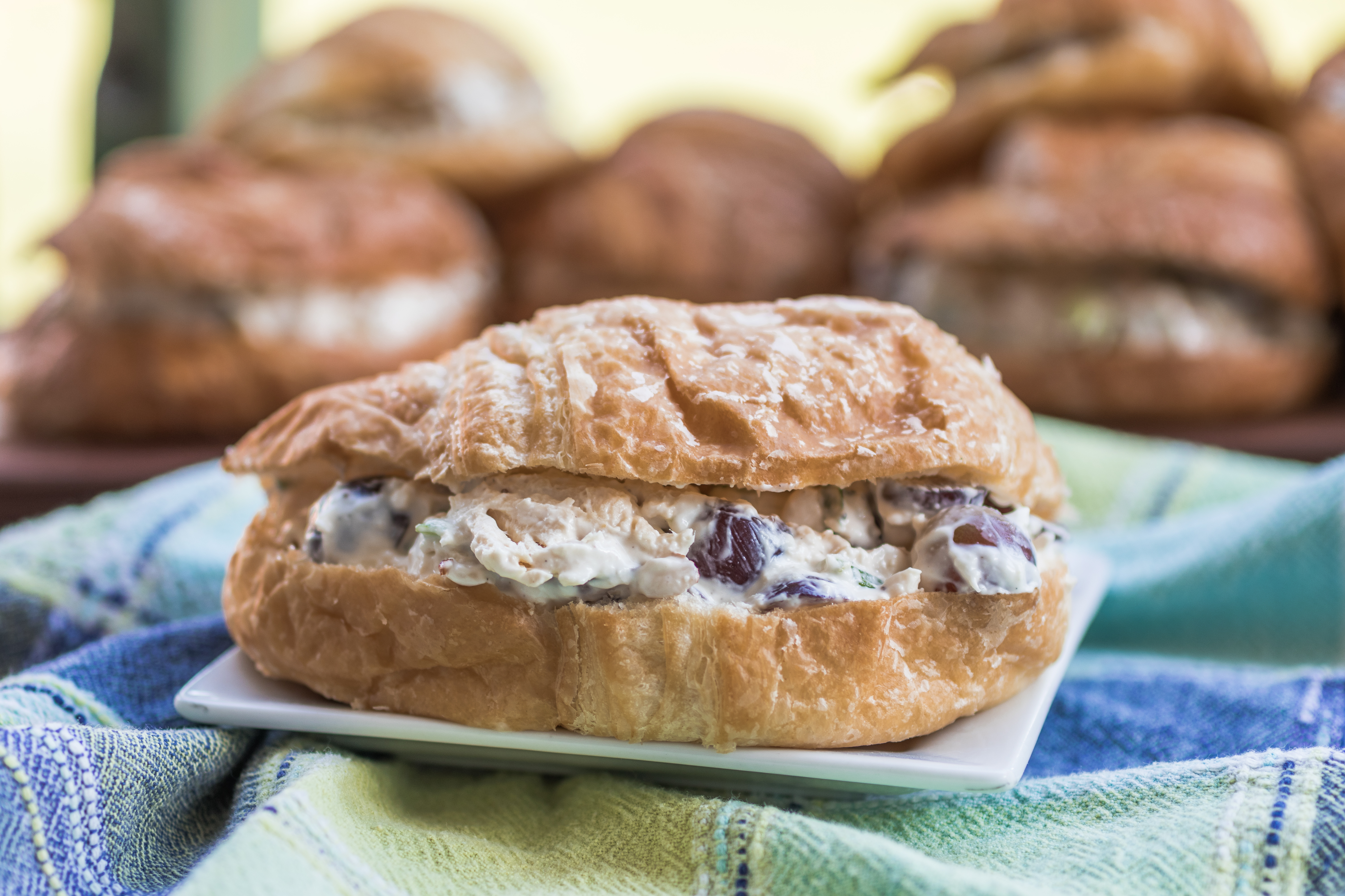 Creamy Chicken Salad Recipe | Chicken Recipe | Chicken Salad | Easy Chicken Salad | Chicken Sandwich | Chicken Salad Sandwich | Enjoy a creamy chicken salad sandwich with this easy recipe from SixCleverSisters.com!