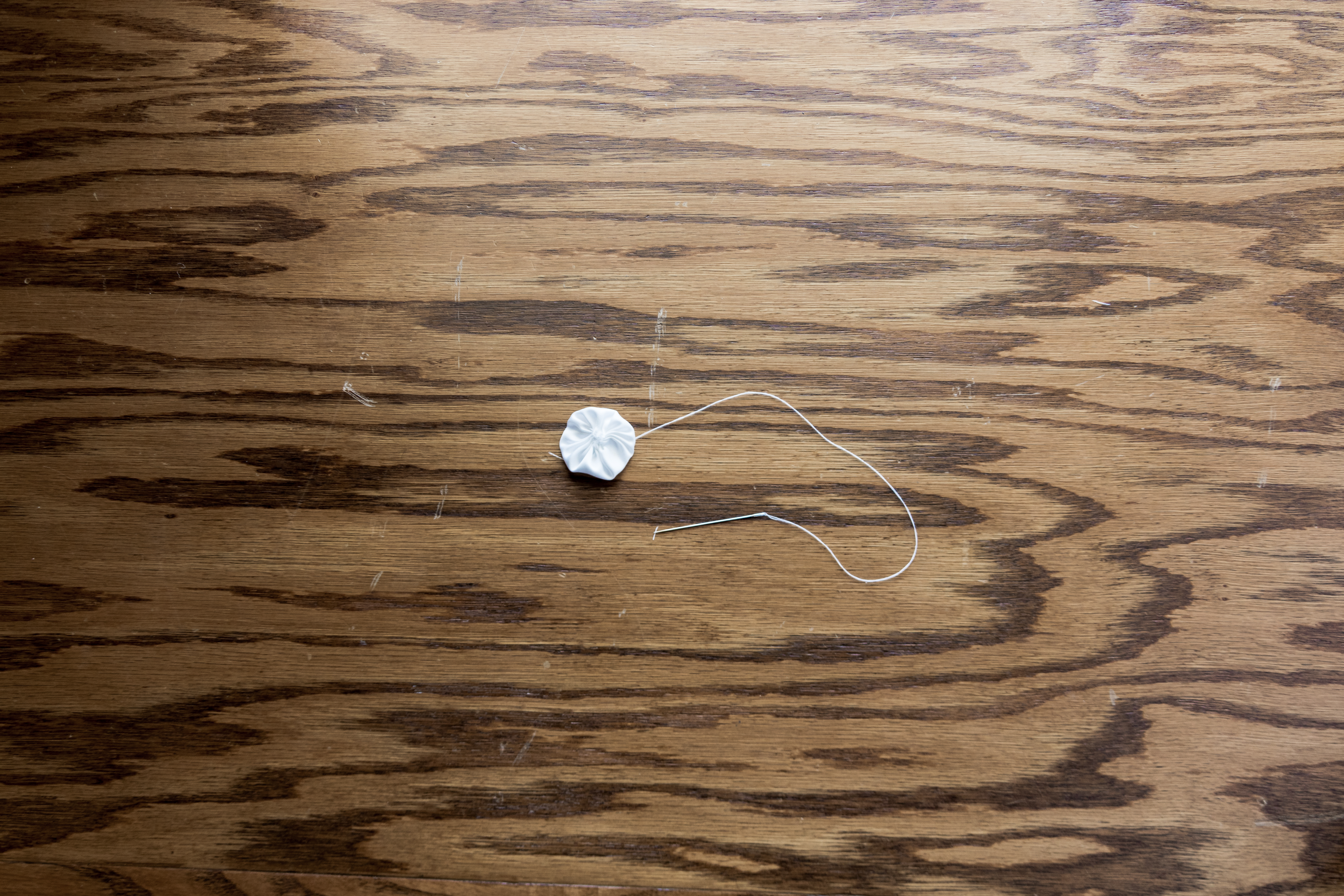 DIY Fabric Rosettes | Fabric Flower Tutorial | Learn how to make fabric rosettes in this easy tutorial from SixCleverSisters.com.