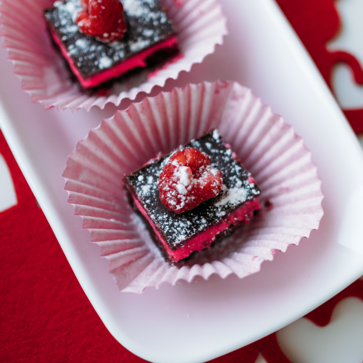 Valentines Desserts | Valentines Dessert Ideas | Valentines Desserts To Make | Valentines Dessert Ideas Easy | Brownie Recipes | Brownie Recipes Easy | Raspberry Brownies | Raspberry Brownie Recipes | Want a decadent looking Valentine's Day dessert but one that's still easy to make? These chocolate raspberry layer brownies are the bomb! #valentines #valentinesday #dessert #dessertfoodideas #recipe #recipeoftheday #chocolate