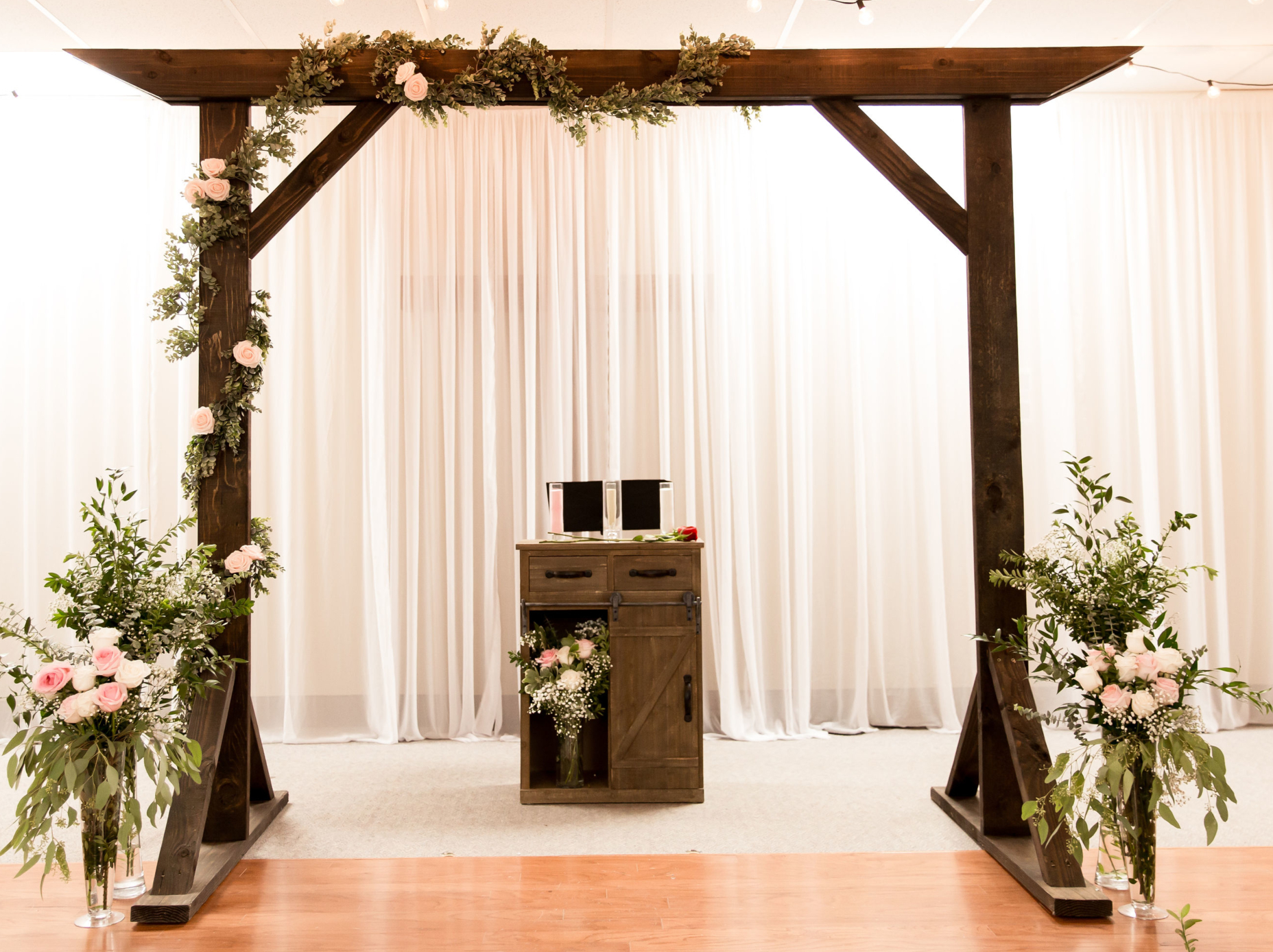 My fiancé and I really wanted a big wooden arch or arbor for our wedding in...