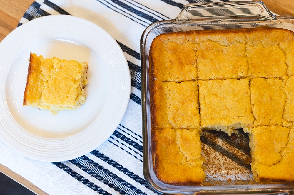 Easy Jiffy cornbread recipe baked to a golden brown in a glass baking dish.
