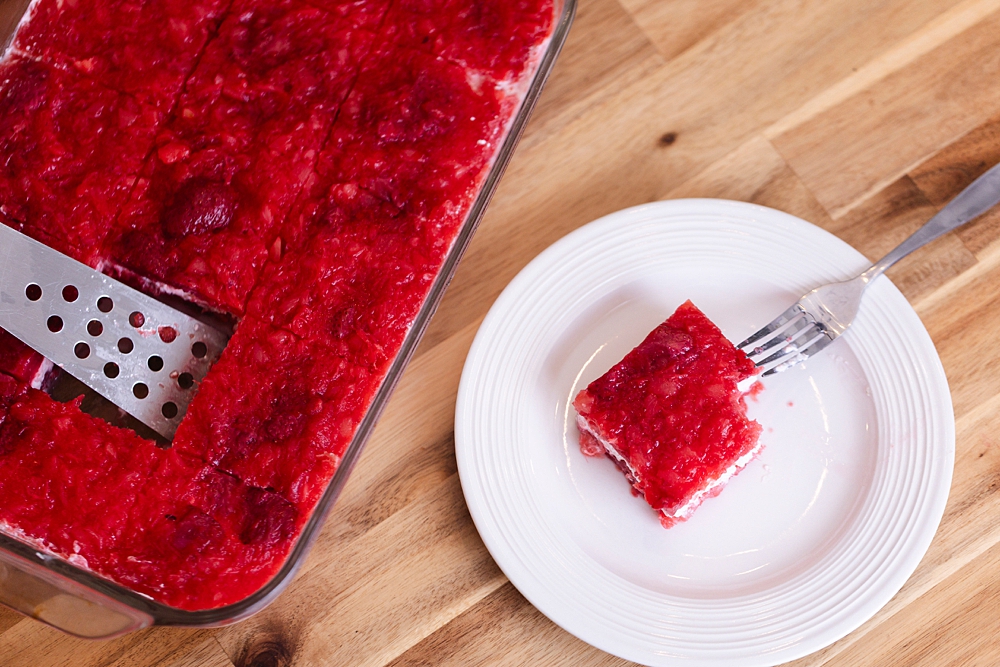 This creamy strawberry jello salad with frozen strawberries, pineapple, and a sour cream layer is a nostalgic, easy dessert perfect for potlucks and holidays.
